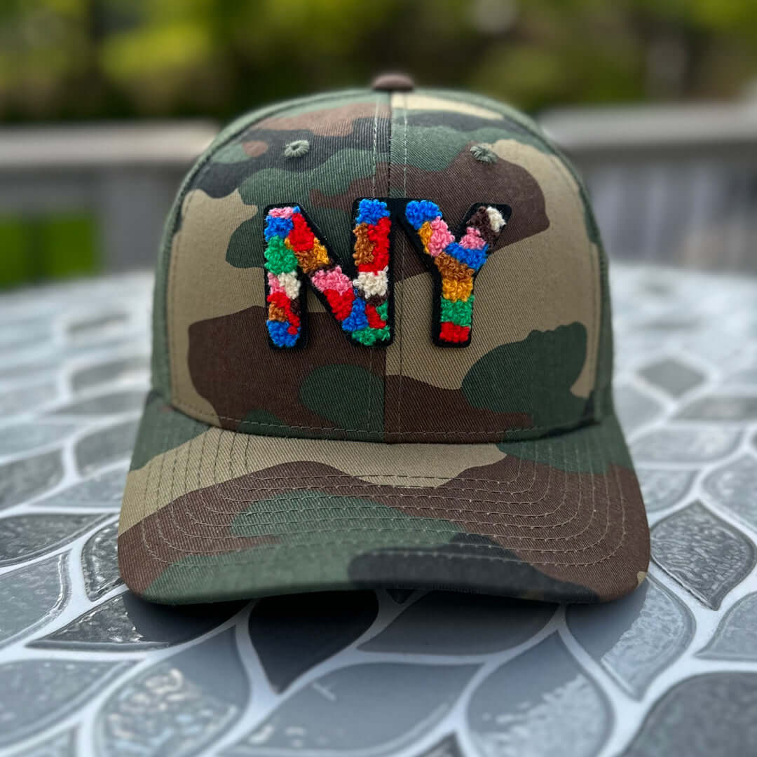 The City Collection NY Chenille Camo Patched Hat