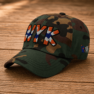 Right Side view of camouflage New York rhinestone baseball hat with orange, blue, and silver crystal lettering - Rebel P Customs